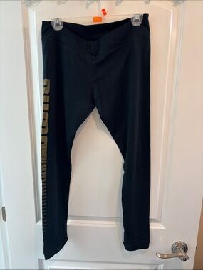 Puma Black Leggings with Gold Side Logo